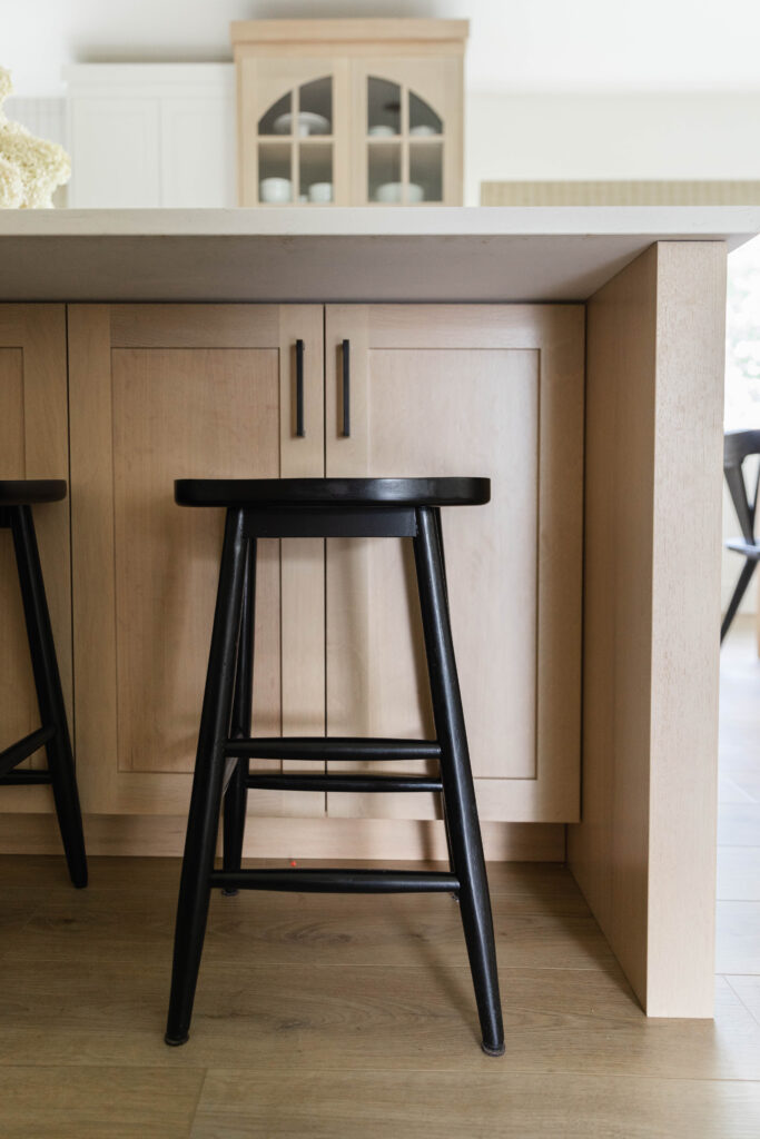 Black Backless Counter Stool in a custom kitchen | Meg & Co