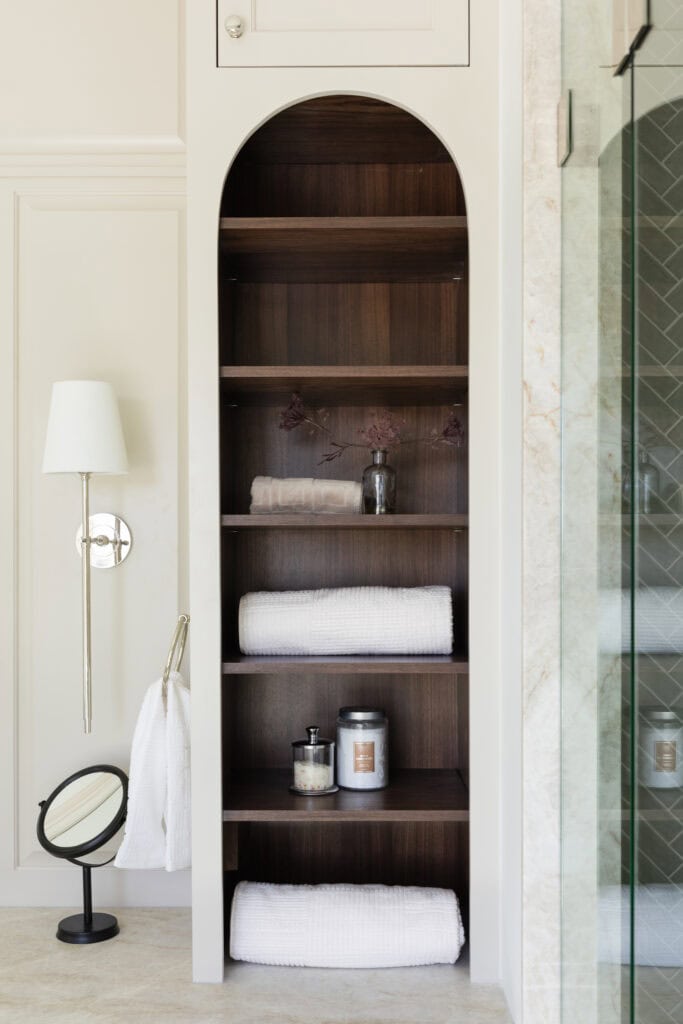 Bathroom Wall Sconce Lights flanking built-ins in the bathroom | Mag & Co
