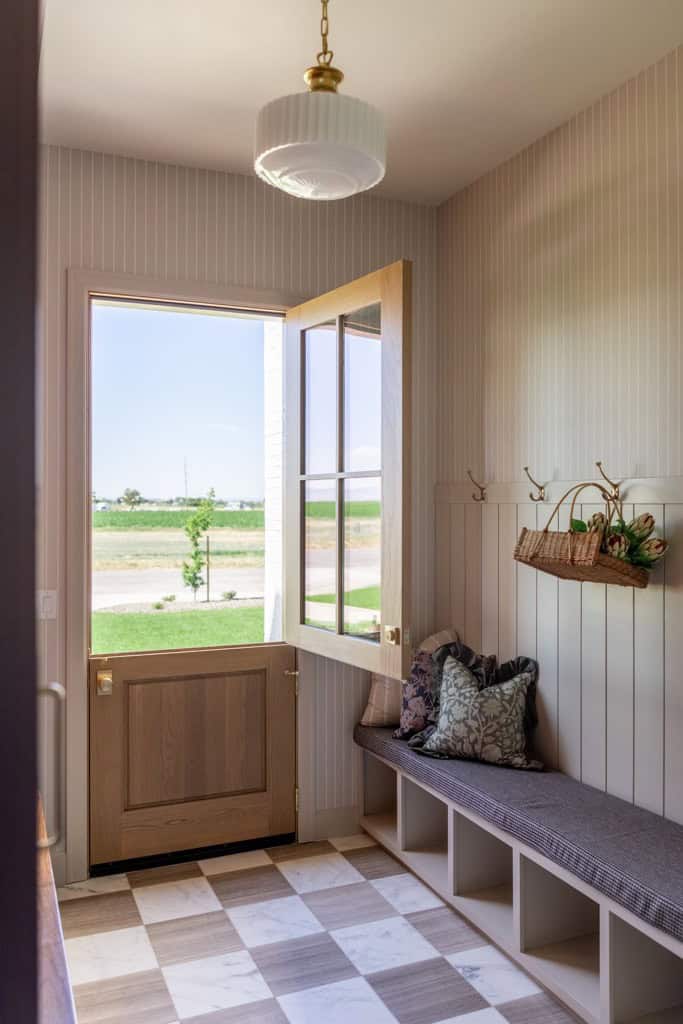 a photo of a mudroom recently completed by Meg & Co, that features a Milton Road Light; Perfect Mudroom Ceiling Light for this beautiful space
