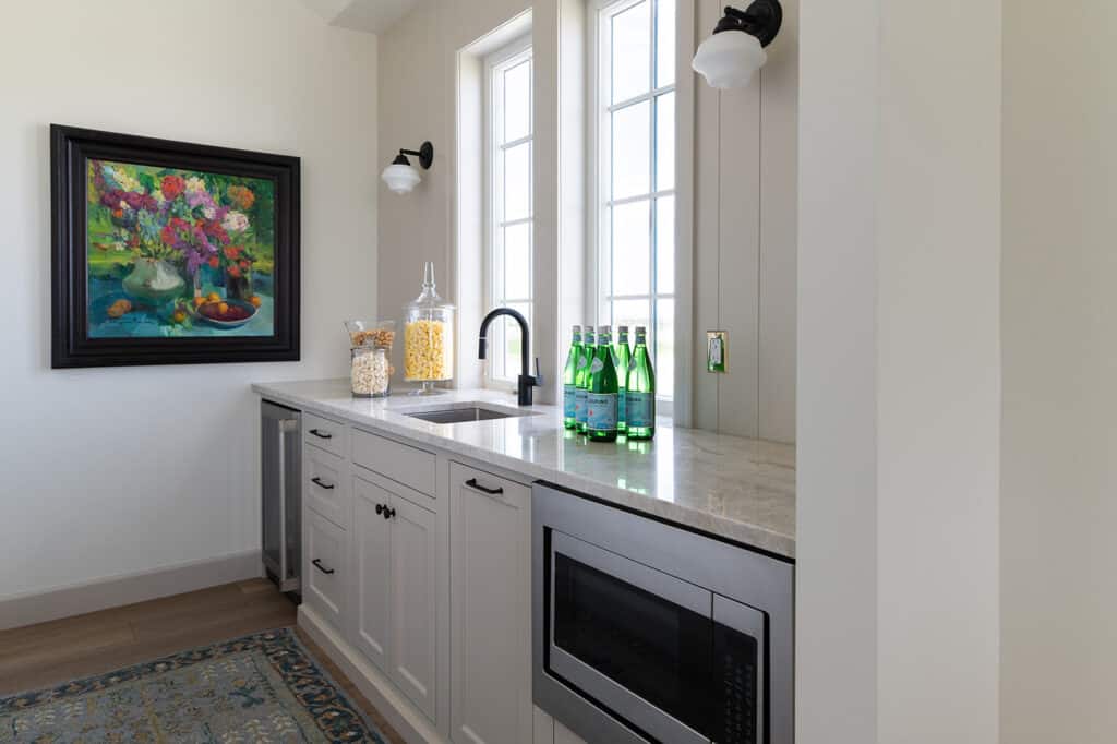 a pair of Modern Wall Scones in a Wet Bar are a great example of task lighting | Meg & Co  