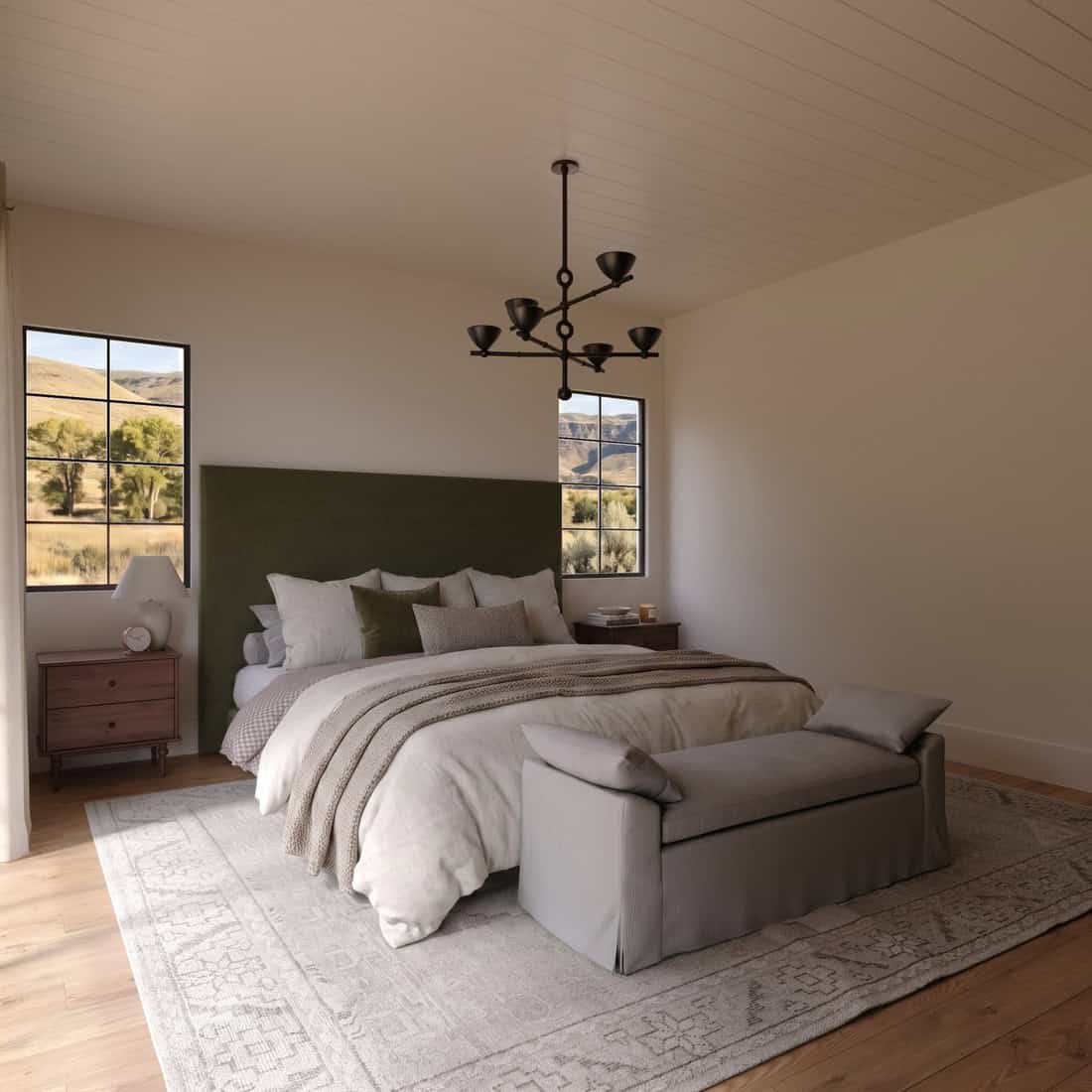 The Merrick Junior Suite - Luxury Custom Home Hailey Idaho Junior suite in The Merrick custom home featuring warm wood built-ins, a fireplace, vaulted ceiling, and mountain modern finishes.