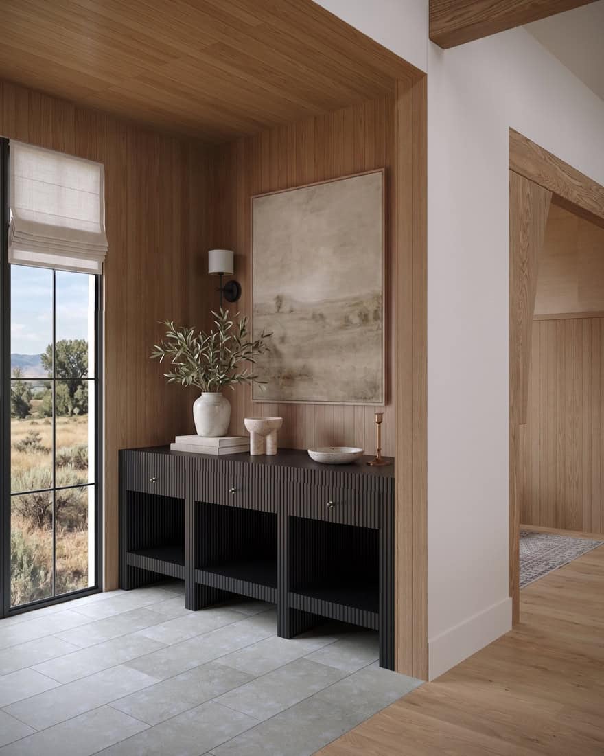 The Merrick Mountain Modern Entry - Luxury Custom Home Hailey Idaho Mountain modern entry in The Merrick custom home in Hailey, Idaho, featuring warm wood cabinetry, natural finishes, and large windows.